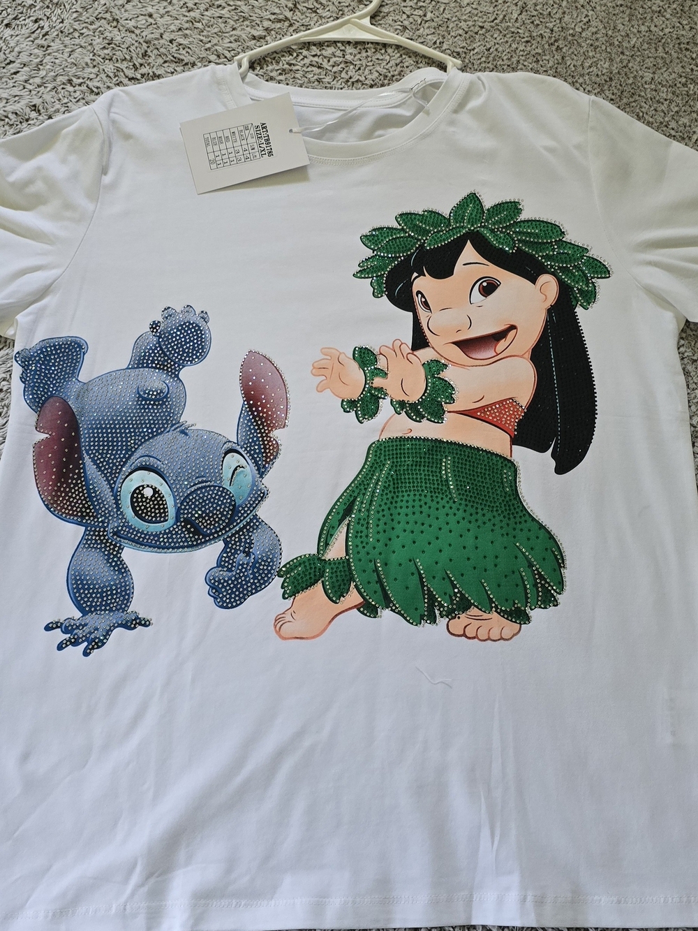 White Women’s Graphic T-Shirt with Green Hula Design